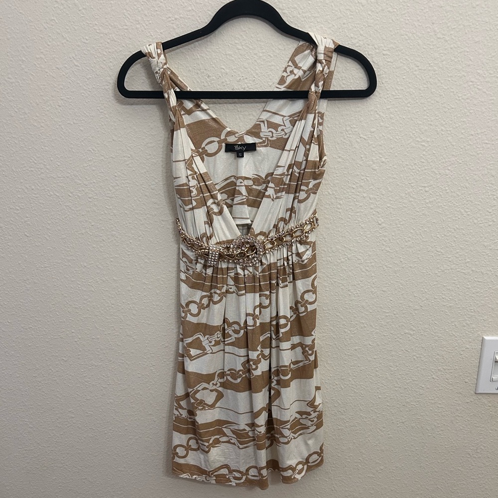 NWOT. Sky gold dress with rhinestone stone belt embellishment.